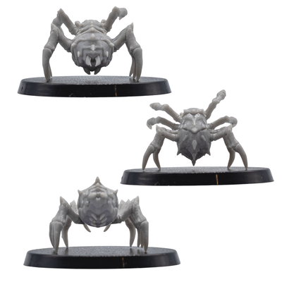 Back angle views of unpainted Giant Spider resin miniatures showing rear body detail, spiked armour plates, long legs, and round bases.