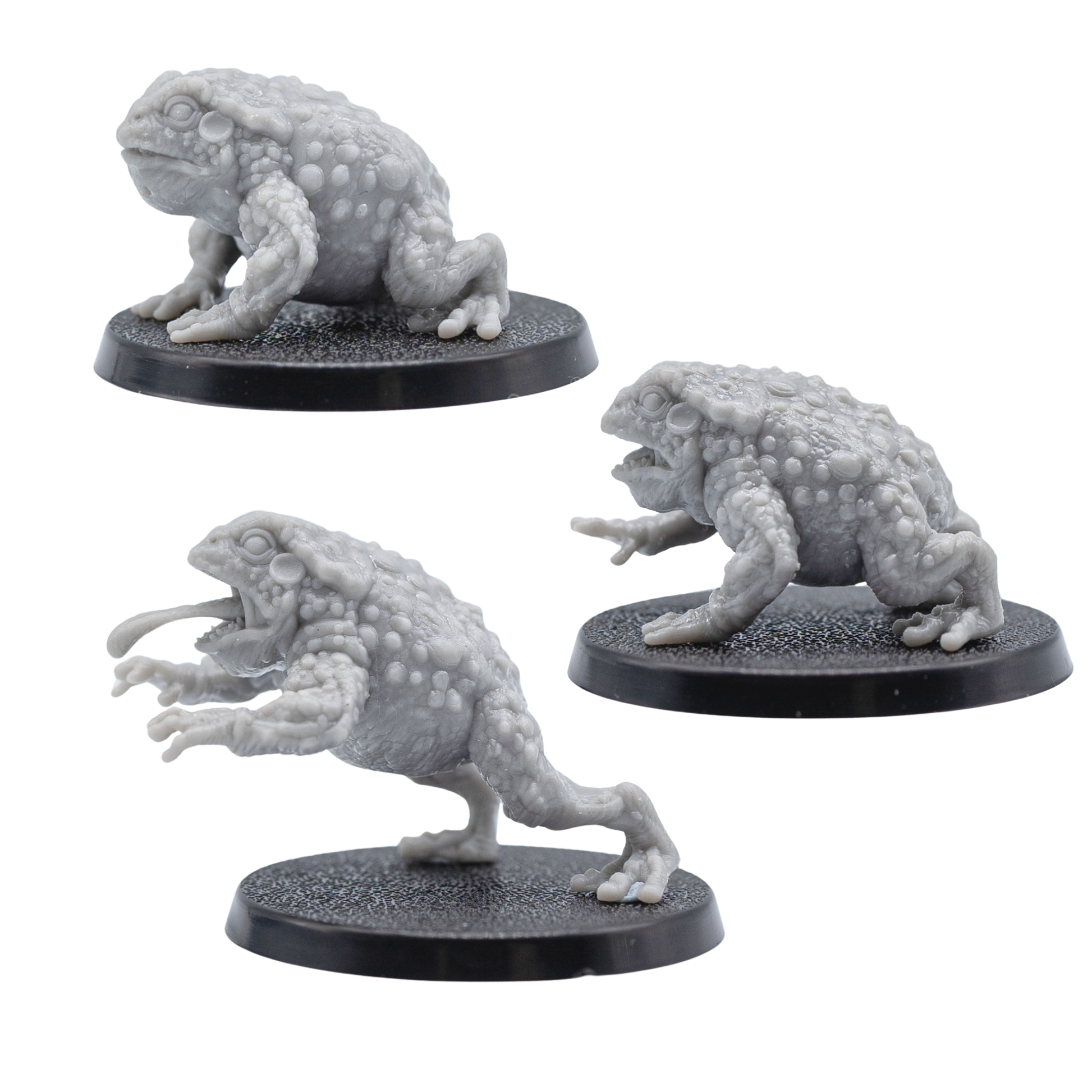 Angled views of unpainted Giant Toads by Forged Path Miniatures showing all three creature poses on 40mm round bases.