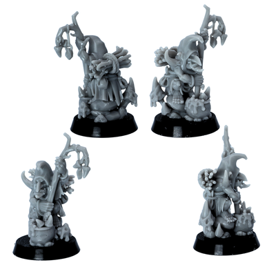 Unpainted goblin shaman miniature with staff, cauldron, and small creature details shown from multiple angles.