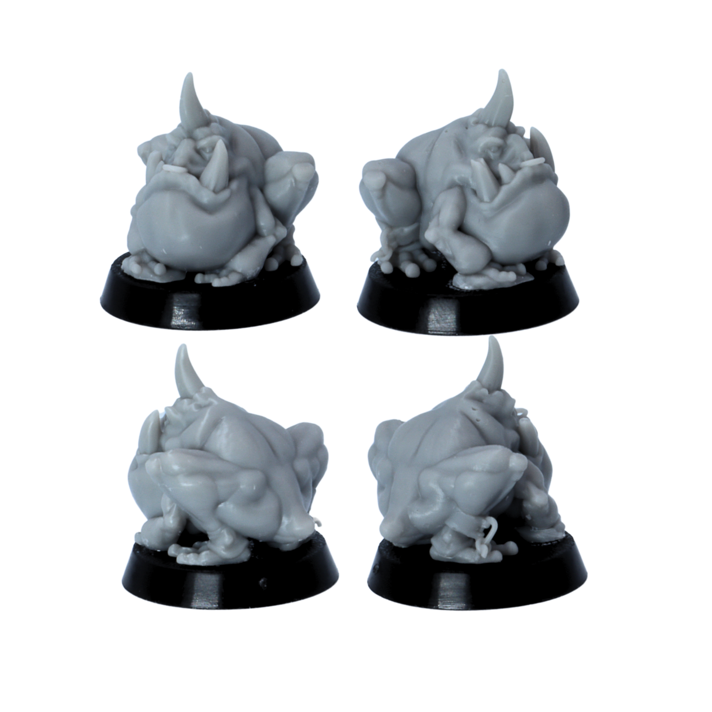 Unpainted squat tusked goblin creature miniature shown from multiple angles on a round base.