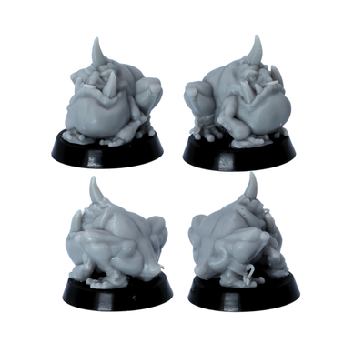 Unpainted squat tusked goblin creature miniature shown from multiple angles on a round base.