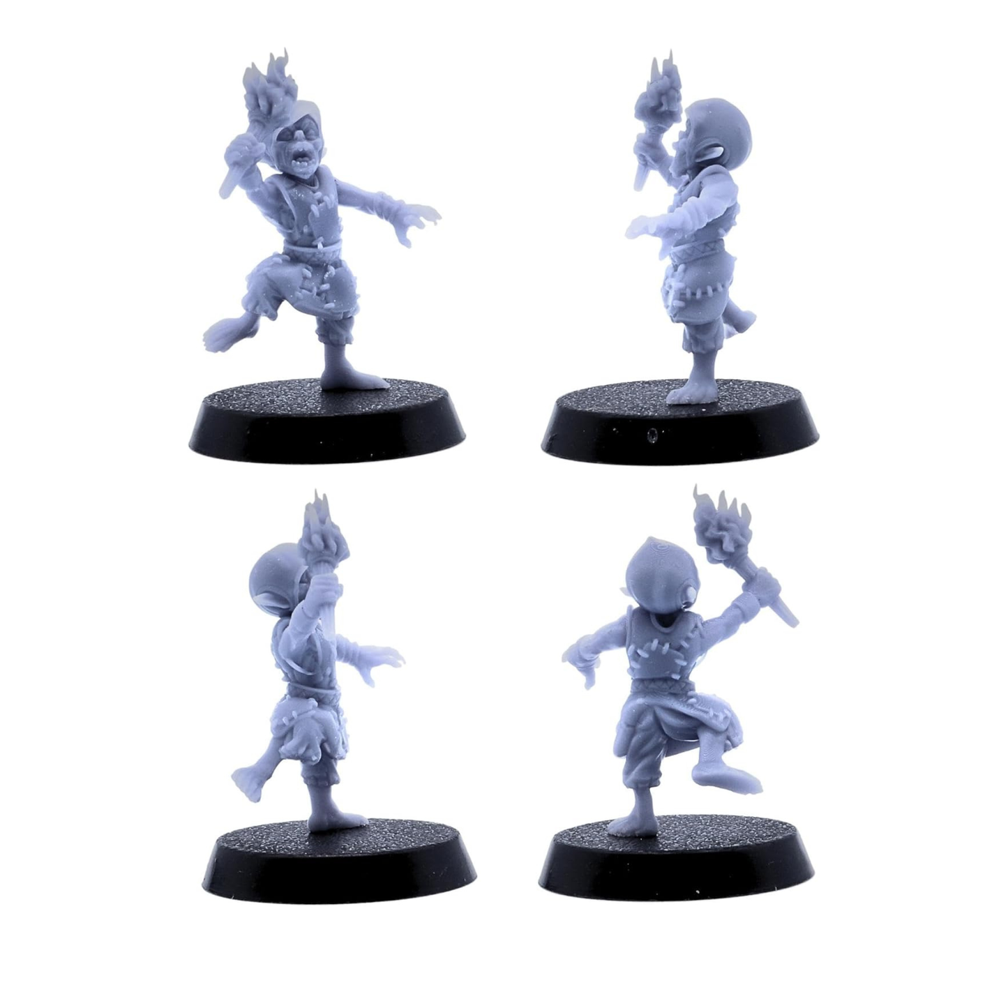 Goblin miniature charging forward while holding a flaming torch.