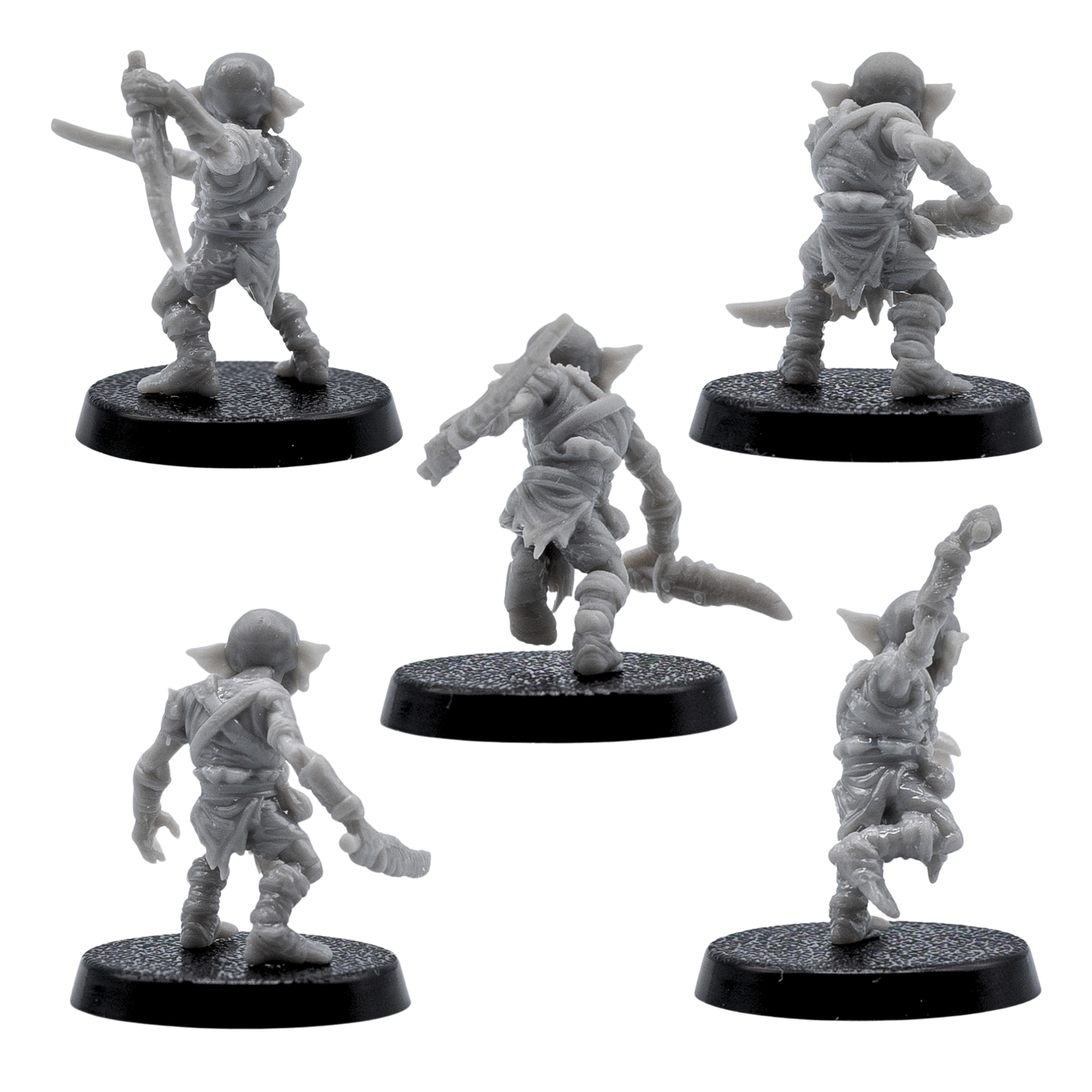 Rear views of unpainted Goblin fantasy miniatures showing clothing, weapons, poses, and resin sculpt detail.
