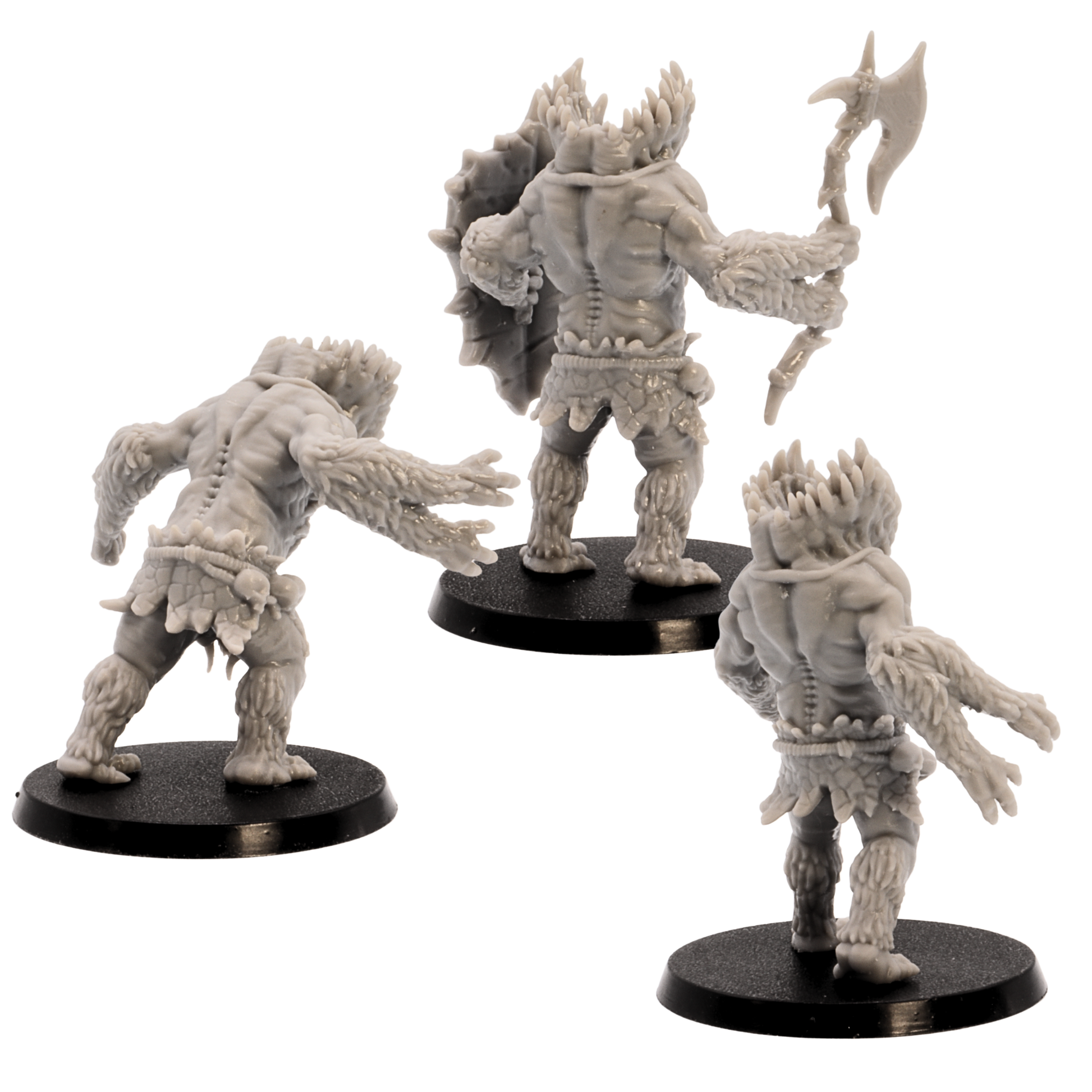 Rear views of the unpainted Gug Monster miniatures showing sculpted backs, claws, weapon, shield, and round bases.