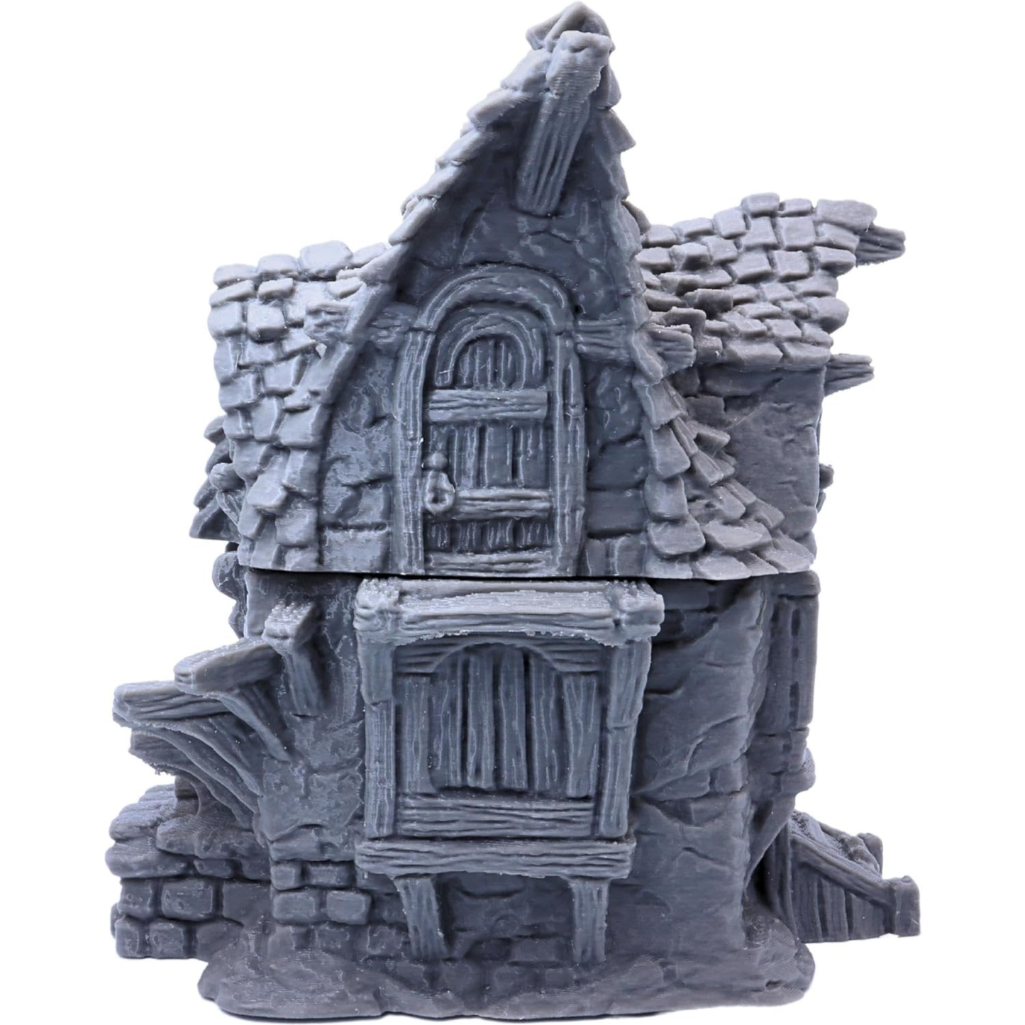 Rear entrance view of the Hagglethorn Cottage with wooden door and cobbled ground details.