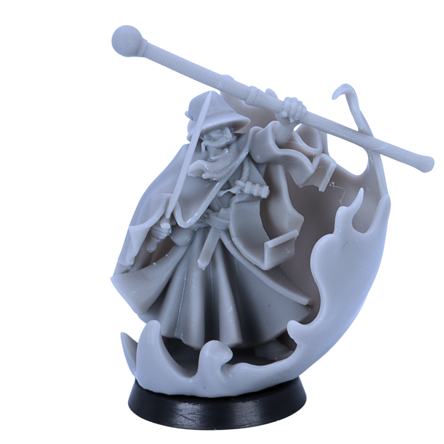 Unpainted healing mage miniature by Highlands Miniatures surrounded by flowing magical energy on a 25mm round base.