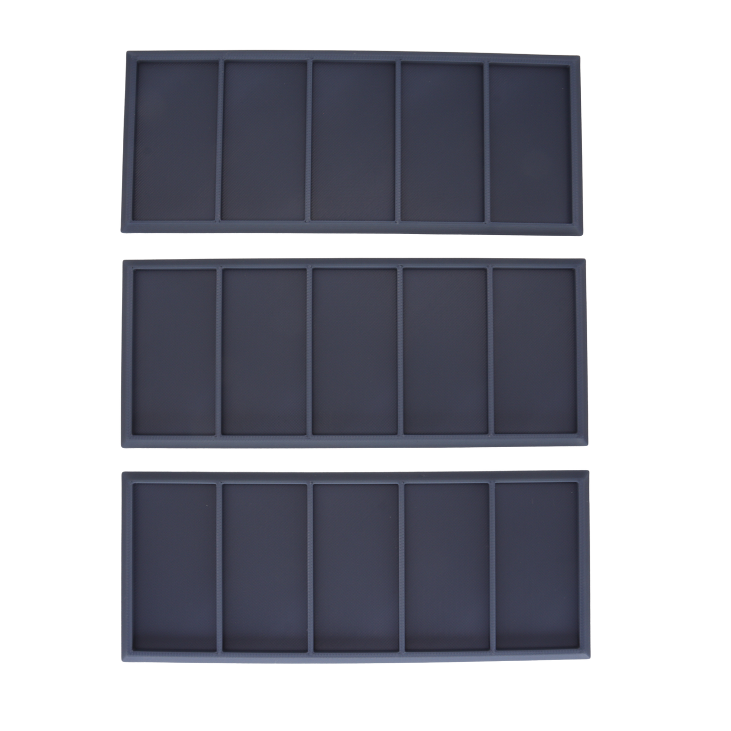 Top view of three Heavy Cavalry Movement Trays showing five individual 60x30mm miniature slots per tray.