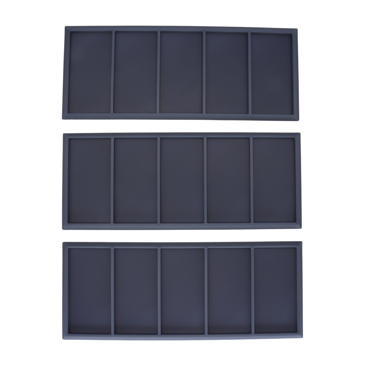 Top view of three Heavy Cavalry Movement Trays showing five individual 60x30mm miniature slots per tray.