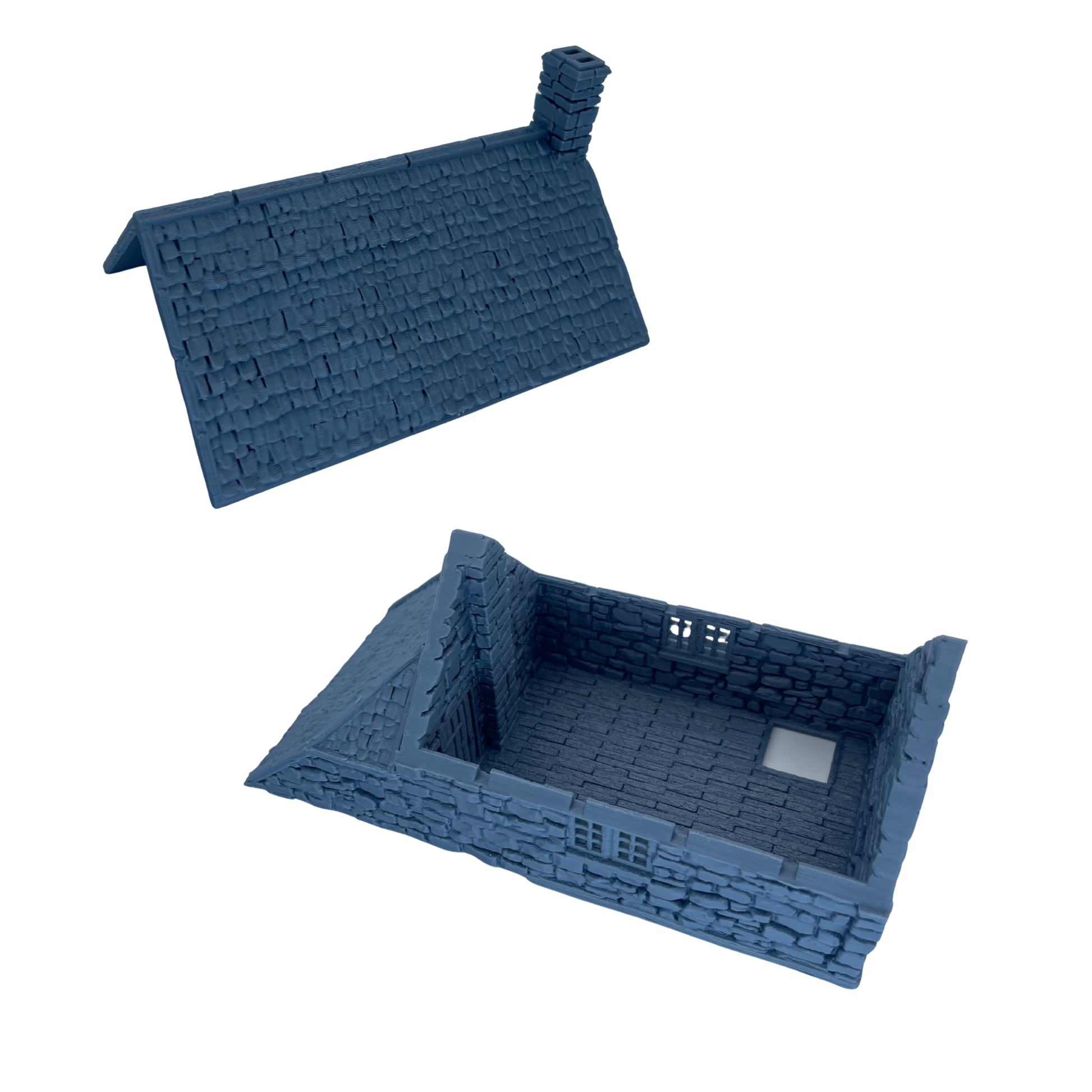 Hollyhock Cottage with the roof removed to show the detailed upper-floor interior and removable roof design.
