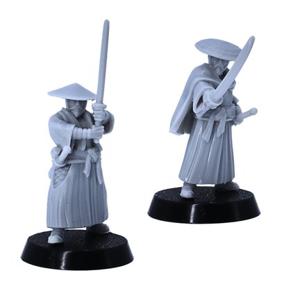 Alt Text: Two Japanese ronin swordsmen miniatures featuring traditional armour, robes, and headwear.