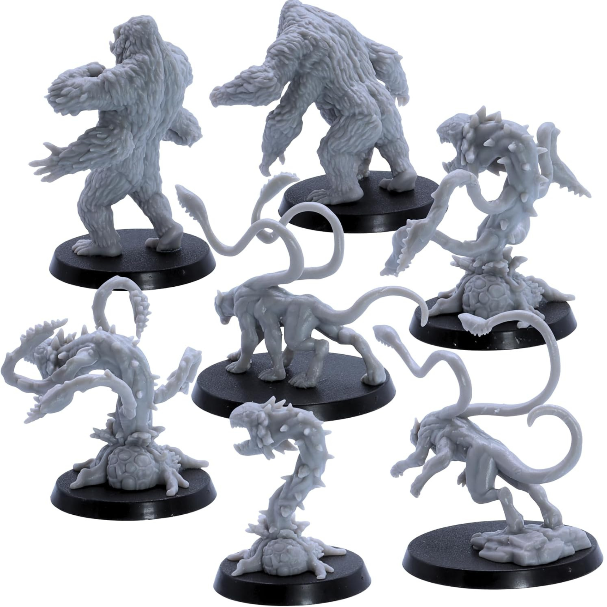 Rear views of the Jungle Set miniatures showing creature and plant sculpt details.