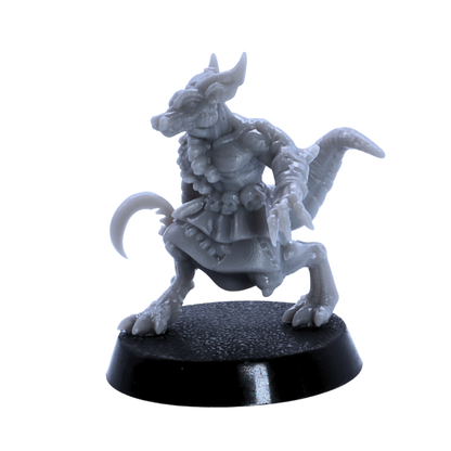 Close view of unpainted kobold warrior miniature with claws, horns, and curved tail.