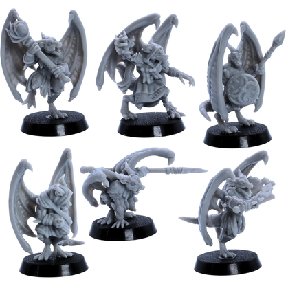 Unpainted robed kobold miniature holding a staff for fantasy RPG encounters.