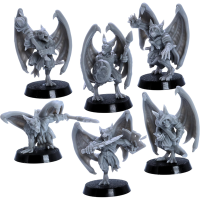 Unpainted winged kobold warrior miniatures with weapons and fantasy armour details.