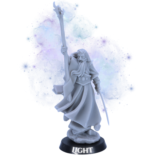 Unpainted Mage of Light miniature by Highlands Miniatures showing raised staff, sword, flowing robes, spellbook, rocky detail, and 25mm round base.