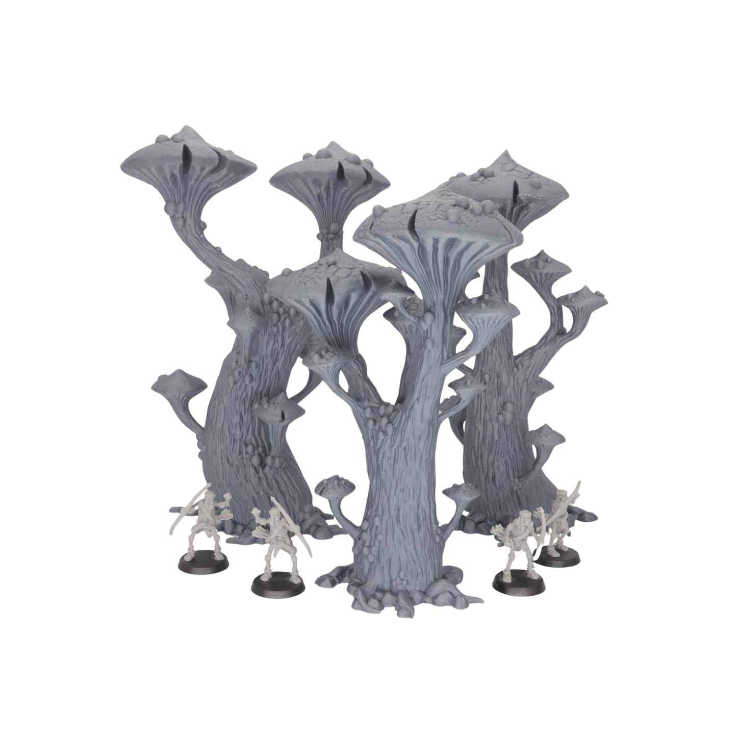 Unpainted Magic Mushroom Trees shown alongside 28mm miniatures for tabletop scale comparison.