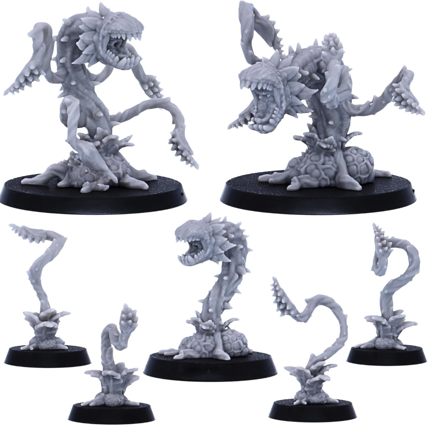 Collection of Man Eating Plant miniatures including larger monsters and smaller plant sprouts.