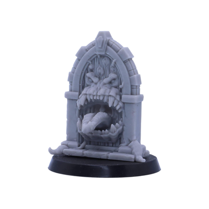 Fantasy stone doorway Mimic with a monstrous face, sharp teeth and extended tongue.