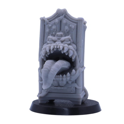 Tall wardrobe Mimic miniature with carved details, oversized teeth and twin tongues.