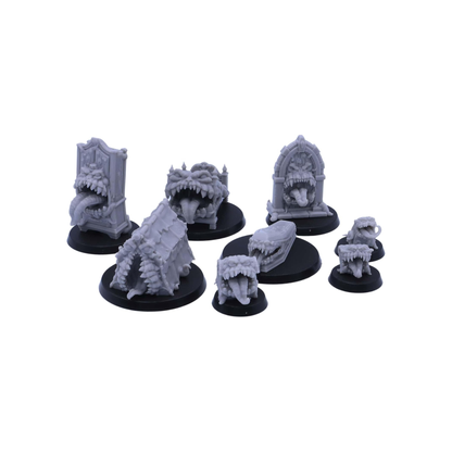 Complete collection of eight fantasy Mimic monsters arranged together for tabletop gaming.