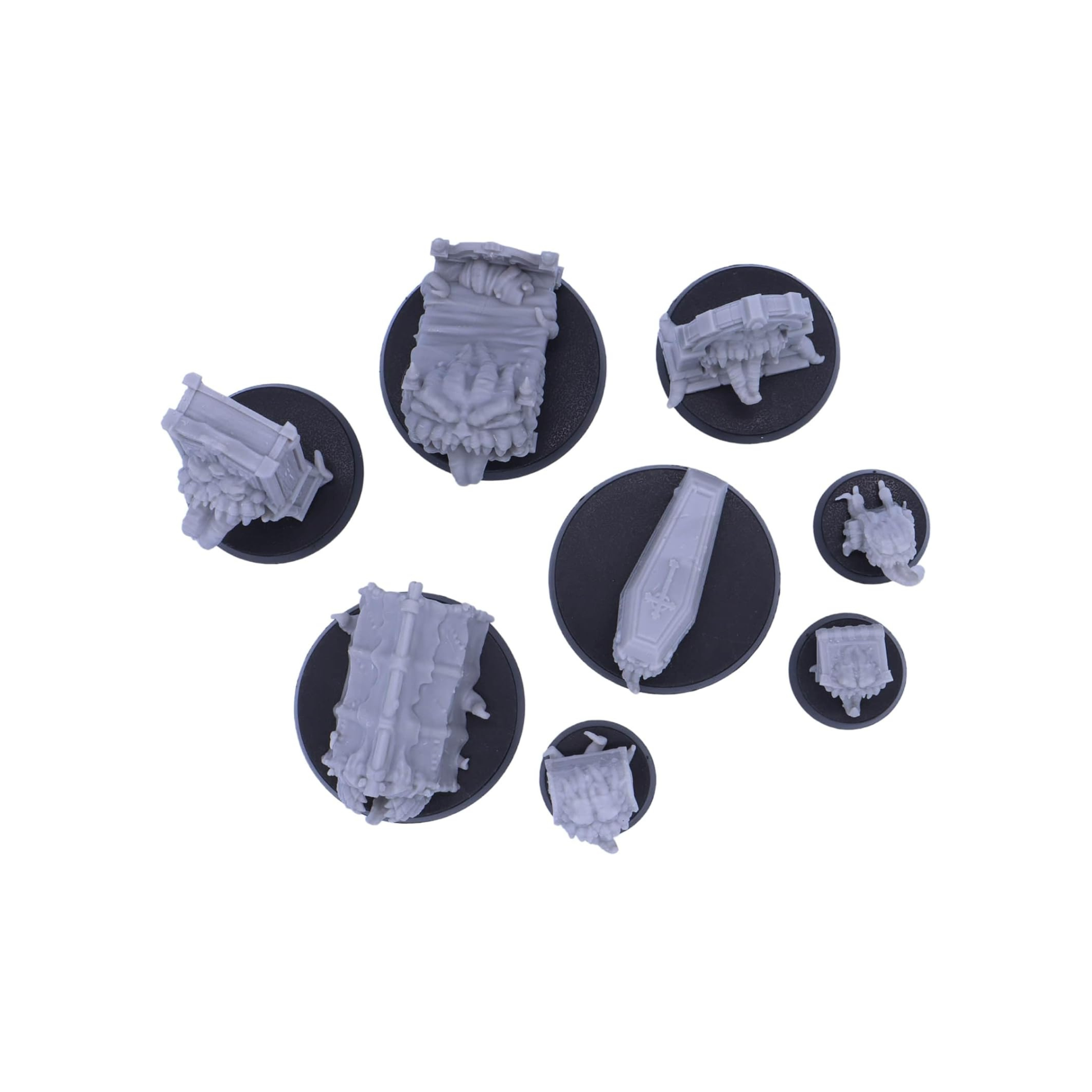 Top-down view of the eight Mimic miniatures showing their different footprints and round bases.