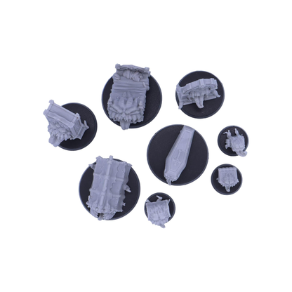 Top-down view of the eight Mimic miniatures showing their different footprints and round bases.