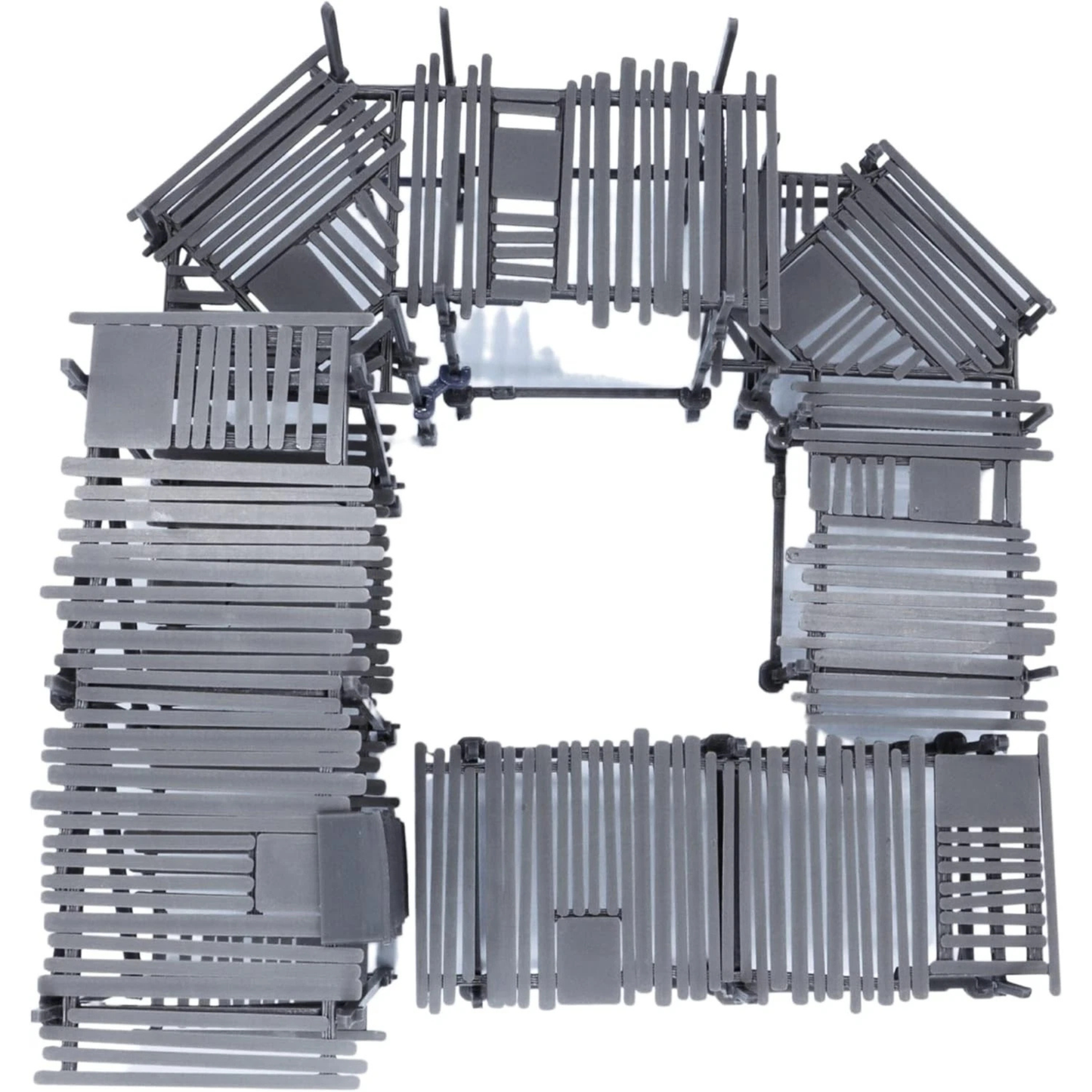 Top-down view of modular scaffolding terrain set showing connected walkways, platforms, ladders, and open central space.