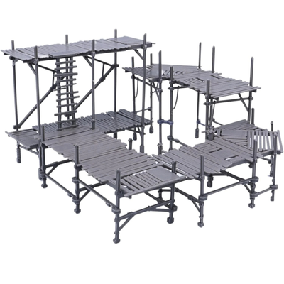 Unpainted modular scaffolding set showing multiple platform sections, ladders, supports, and walkways in grey resin.