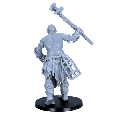 Rear view of unpainted Mountain Giant miniature showing back muscles, raised weapon, torn cloth, and cage accessory.