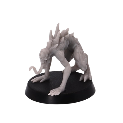 Unpainted crouching Nothic miniature with long tongue, elongated arms, clawed hands, jagged back spines, and hunched posture.