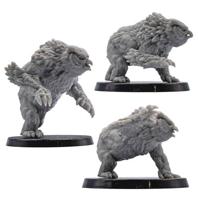 Action pose views of unpainted Owlbear creature miniatures with detailed claws, beaks, feathers, and muscular forms.