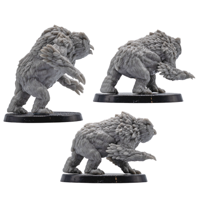 Rear and side views of unpainted Owlbear resin miniatures showing detailed sculpting for tabletop RPG and wargaming use.