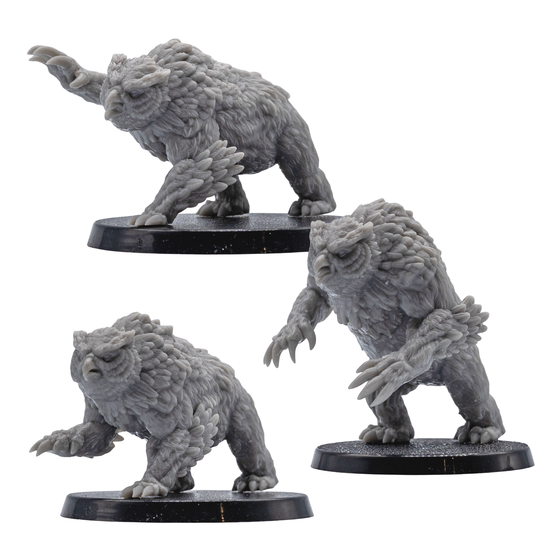 Unpainted Owlbear resin miniatures by Forged Path Miniatures shown from side angles on 50mm round bases.