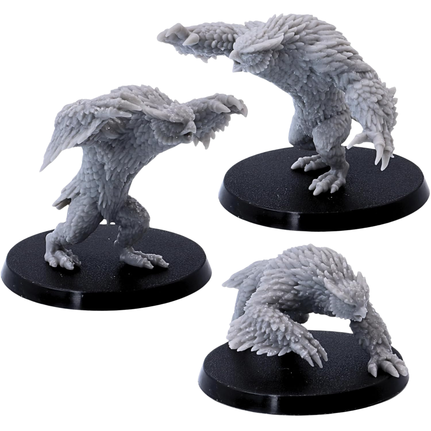 Unpainted set of three Owlbear miniatures showing their different poses and detailed feathered bodies.