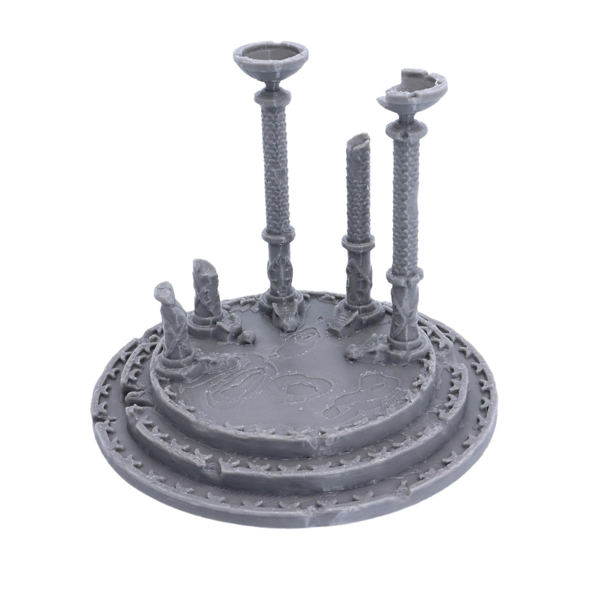 Three-quarter view of the Dragon Dais terrain piece with tall carved columns and broken architectural details.