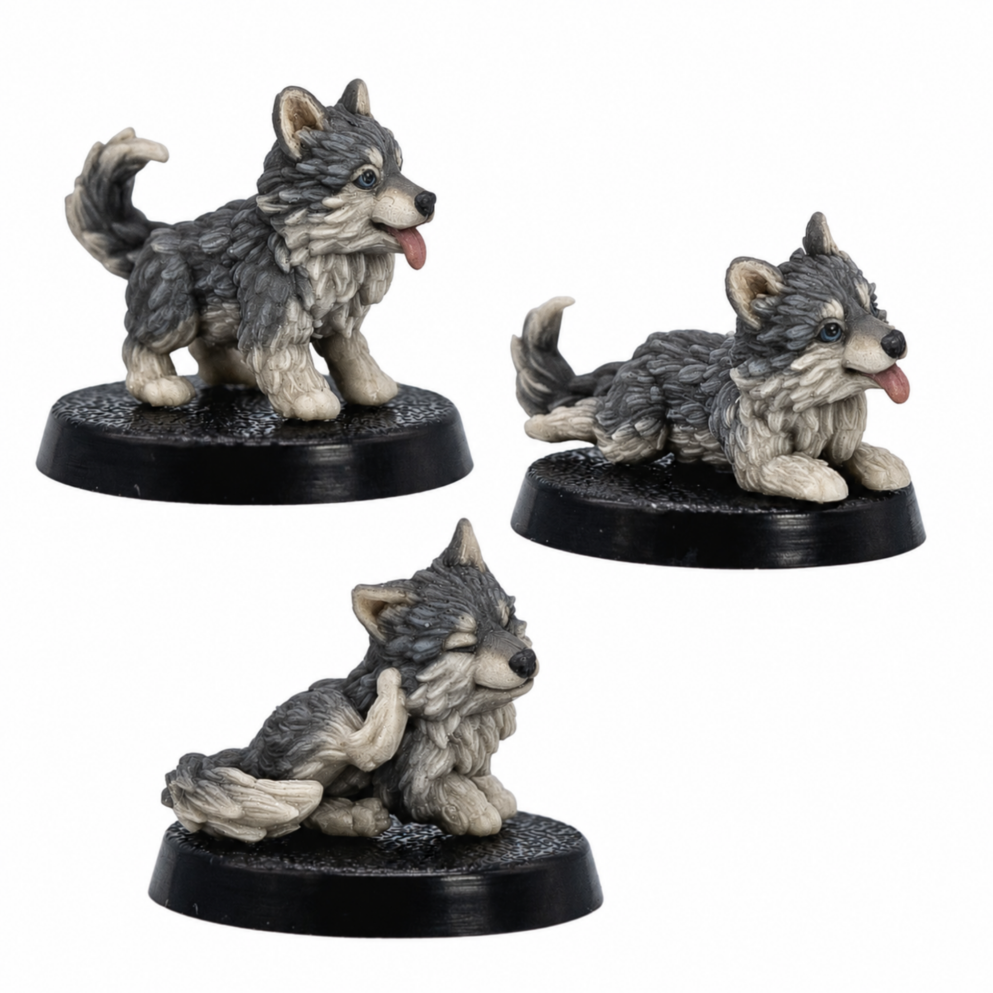 Painted Puppy Familiars by Forged Path Miniatures showing three fluffy puppy miniatures on 25mm round bases.