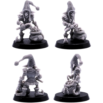 Christmas goblin miniature carrying presents in a sack on a 25mm round base.