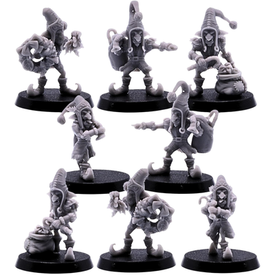 eight unpainted Santa Goblin miniatures in varied festive poses on round bases.