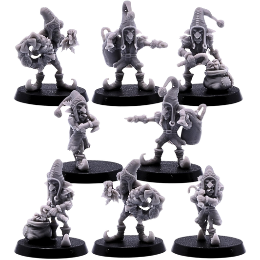 eight unpainted Santa Goblin miniatures in varied festive poses on round bases.