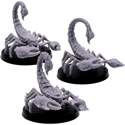 Unpainted set of three giant Scorpion miniatures by Epic Miniatures shown from angled views with large claws, jointed legs, and raised tails.