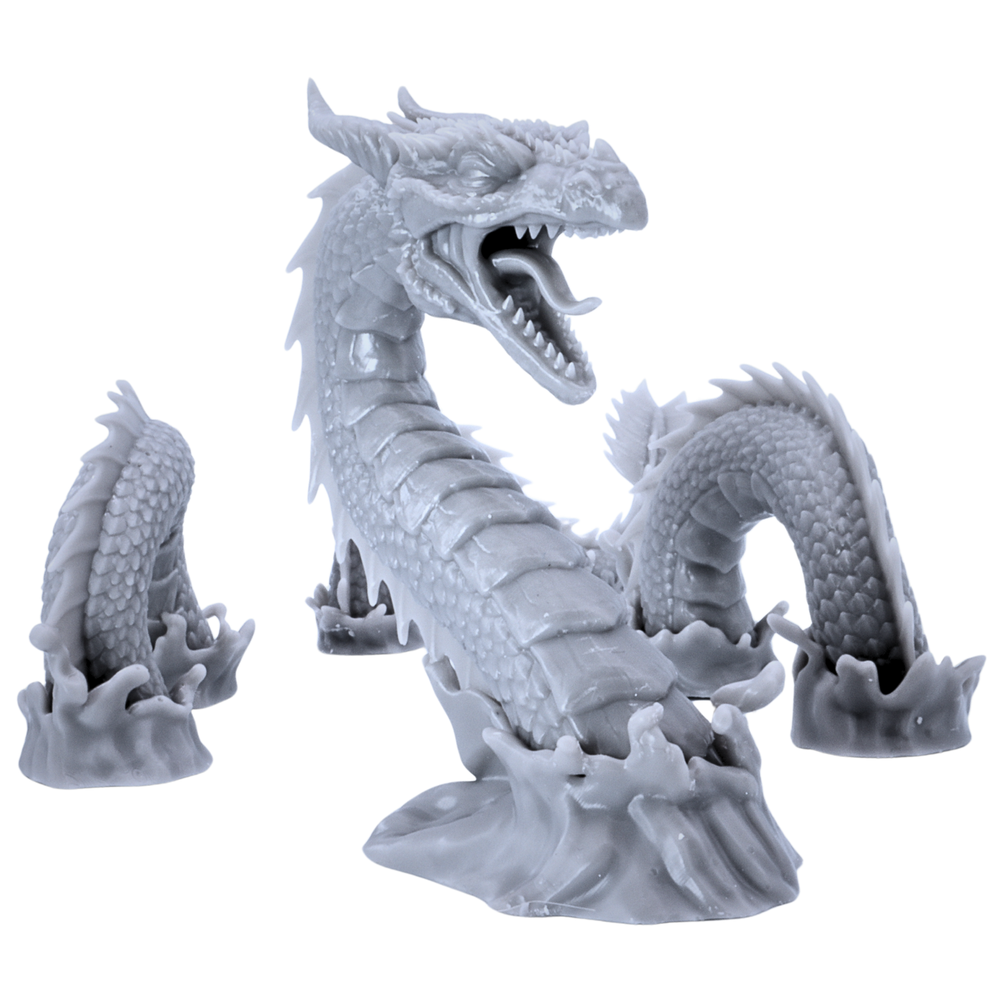 Unpainted Sea Serpent miniature in 4 parts showing the serpent rising from sculpted water effects.