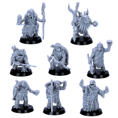 Unpainted Turtle Folk miniatures showing eight fantasy reptilian adventurers with staffs, spear, weapons, robes, and armour.