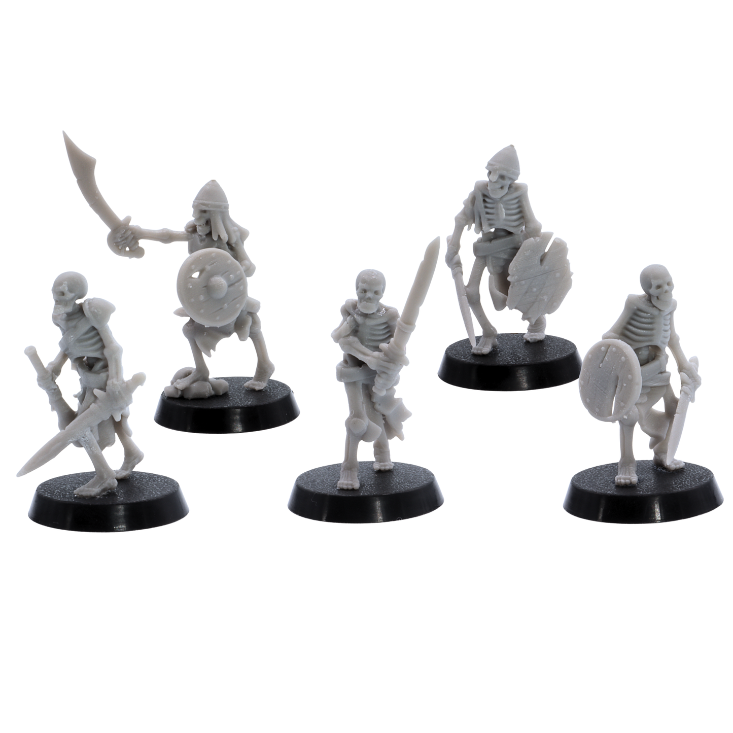Unpainted Undead Skeletal Warriors showing five fantasy skeleton fighters with blades, shields, helmets, and damaged equipment.