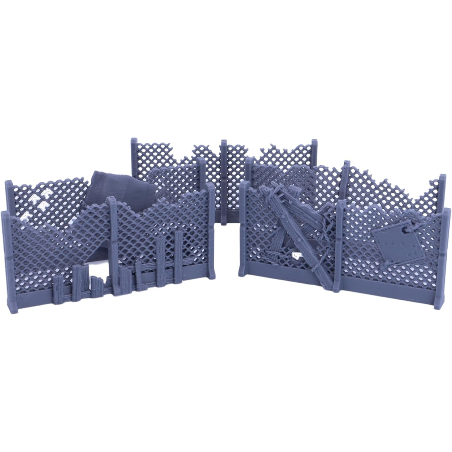 Collection of broken wire mesh fence terrain featuring boards, scrap metal, and damaged panels