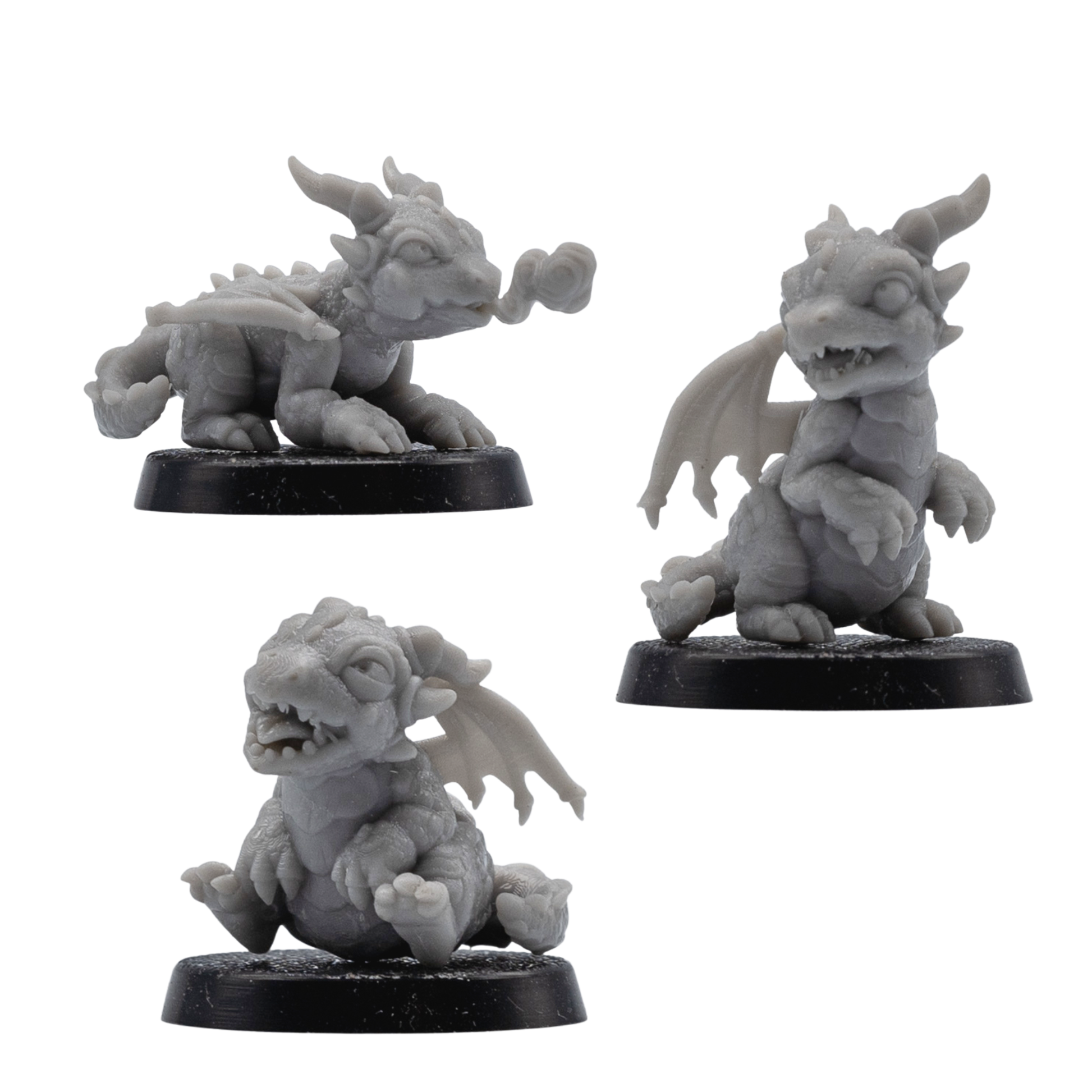 Unpainted Wrymling Familiars set of three baby dragon miniatures on 25mm round bases.