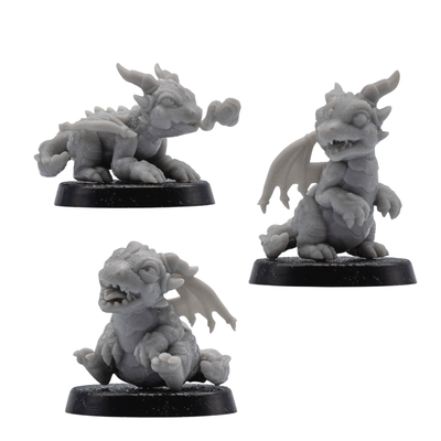 Unpainted Wrymling Familiars set of three baby dragon miniatures on 25mm round bases.