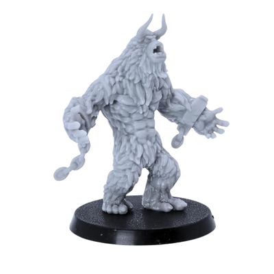 Unpainted roaring Yeti miniature with raised head, horned silhouette, and detailed fur texture.
