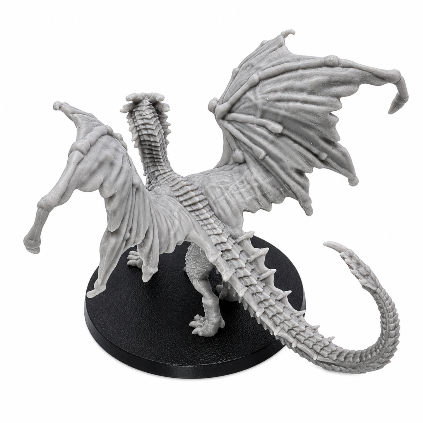 Top rear view of the Young Yellow Dragon miniature showing detailed wings, spine, tail, and resin sculpt texture.