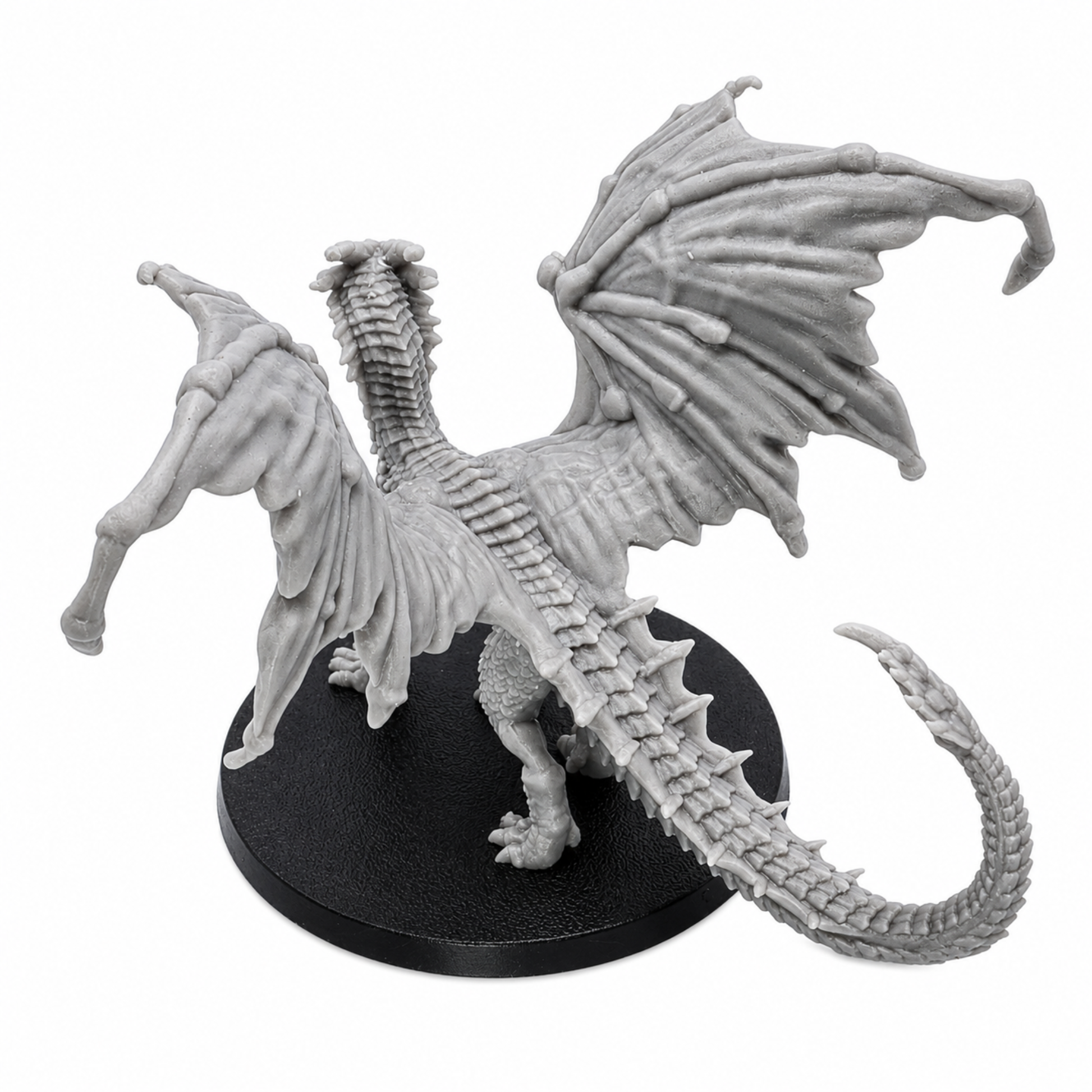 Top rear view of the Young Yellow Dragon miniature showing detailed wings, spine, tail, and resin sculpt texture.