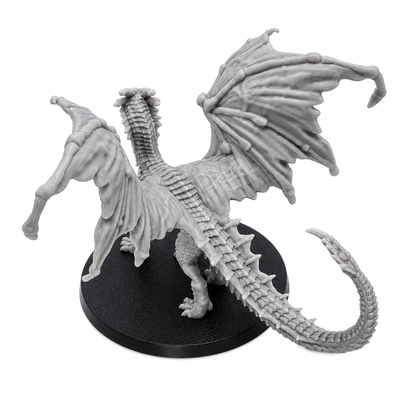 Top rear view of the Young Yellow Dragon miniature showing detailed wings, spine, tail, and resin sculpt texture.